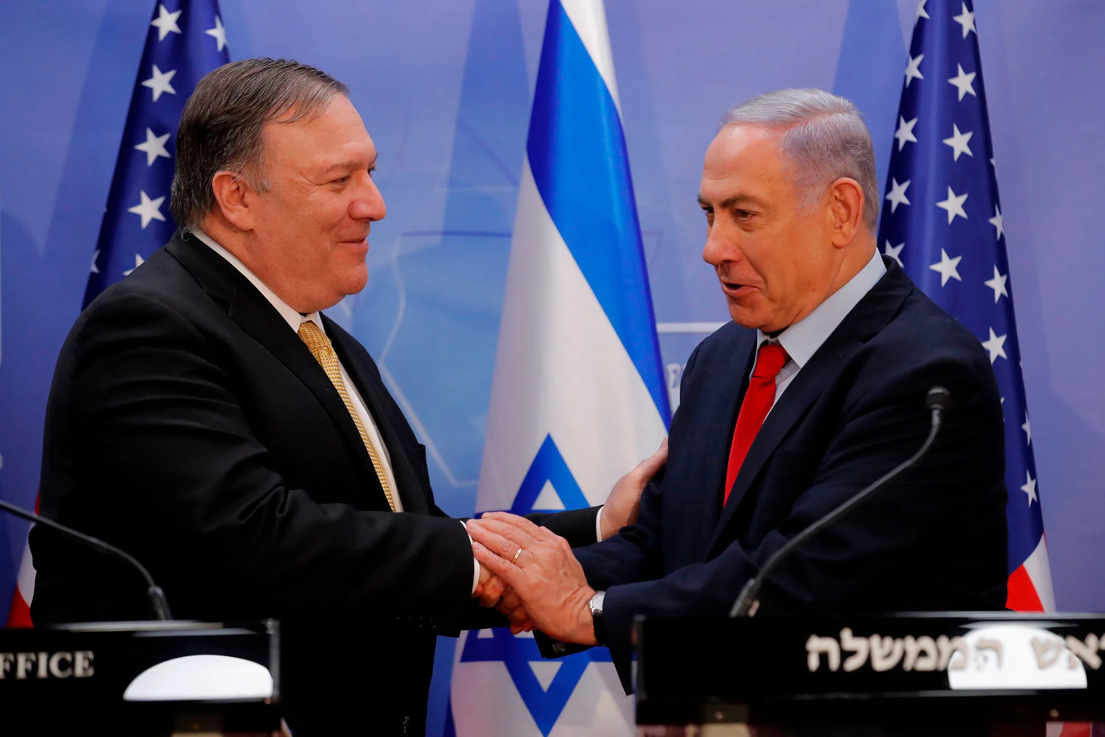 Mike Pompeo, left,&nbsp;and Benjamin Netanyahu shake hands after delivering a joint statement during their meeting in Jerusalem on March 20.&nbsp;