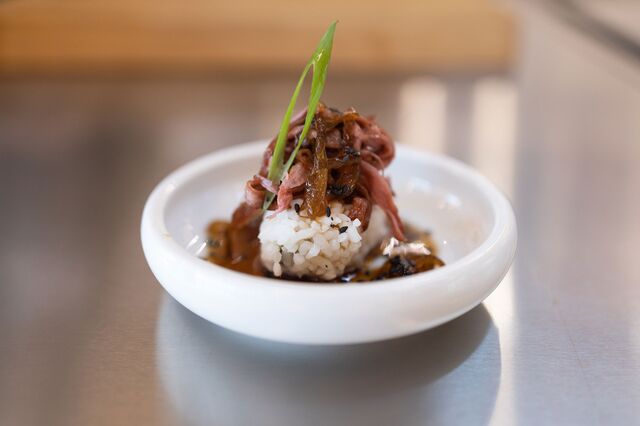 A traditional Japanese beef dish with cultivated thin cut steak in gyudon style, placed on a nigiri rice with caramelized onion dashi is served in the kitchen of Aleph Farms, in Rehovot, Israel, on Sunday, November 27, 2022.