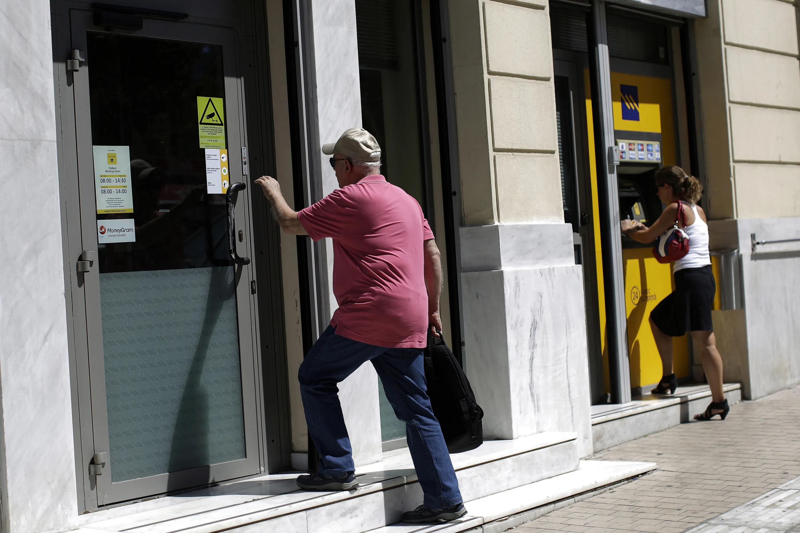 Greek Banks Reopen As Merkel Signals Debt Relief Option