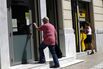 Greek Banks Reopen As Merkel Signals Debt Relief Option