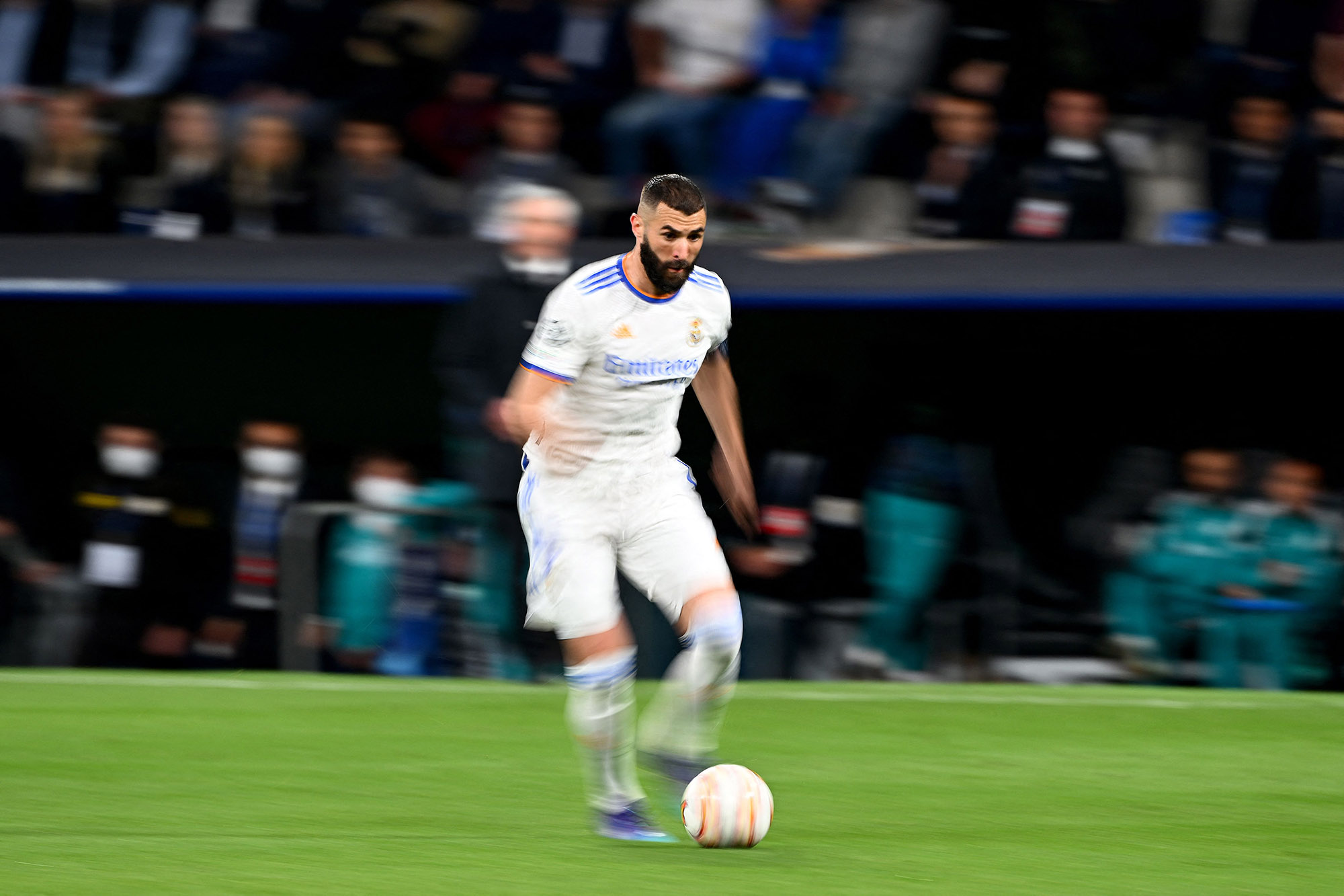 Real Madrid's French forward Karim Benzema runs with the ball during a&nbsp;UEFA Champions League match