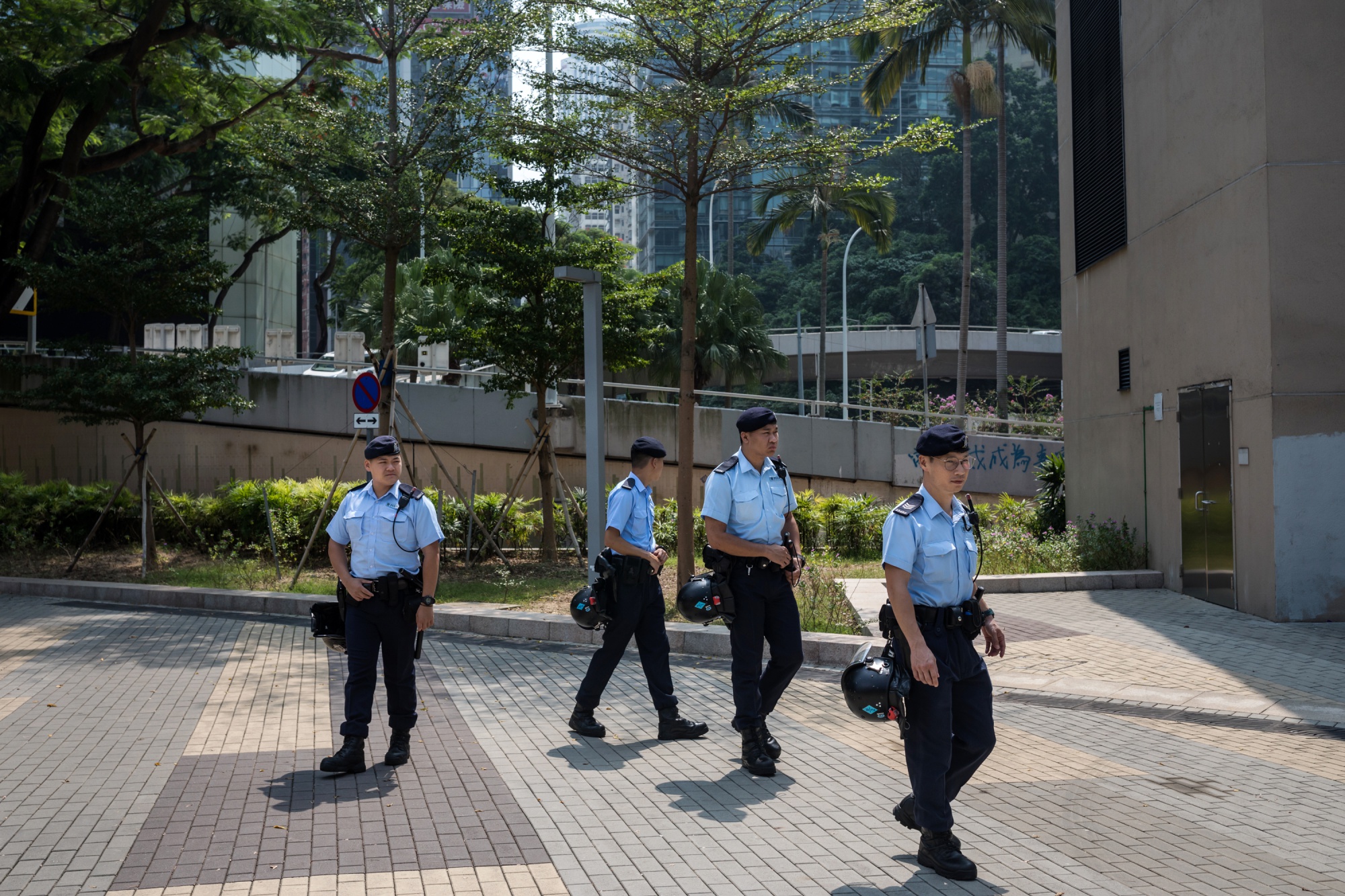 Police officers patrol the Admiralty district on Oct. 2.