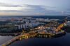Commercial and residential buildings stand in Singapore as vehicles travel along the Causeway across the Straits of Johor at dawn in this aerial photograph taken above Johor Bahru, Johor, Malaysia, on Thursday, June 20, 2019. Malaysia's Prime Minister Mahathir Mohamad said he underestimated the challenges of governing the country before his shock election victory last year. “I underestimated because we were on the outside and we didn’t get any information on what was happening on the inside,” Mahathir said.