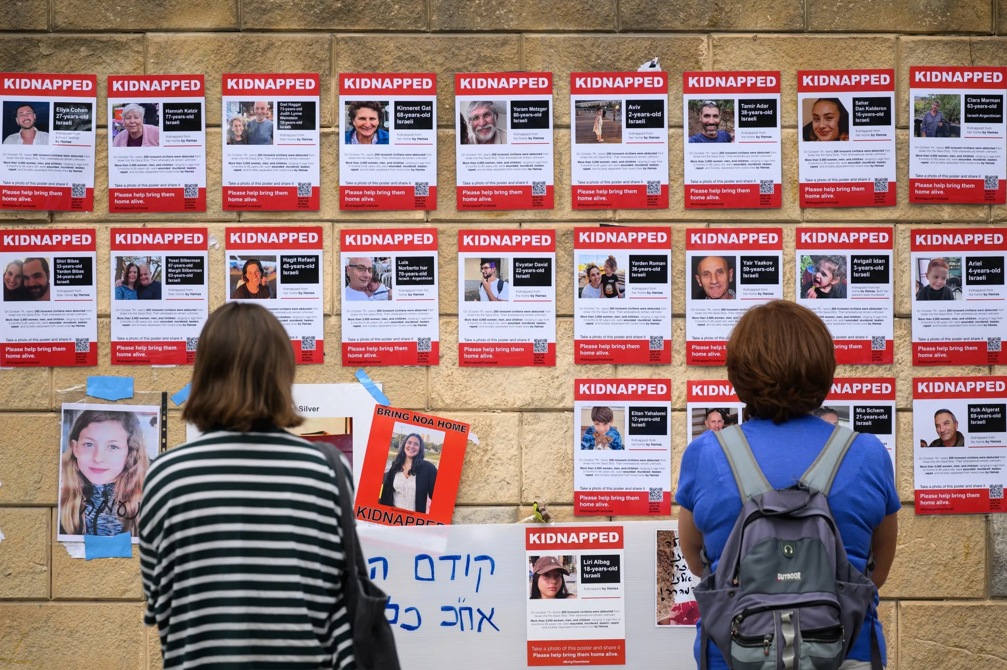 Photographs of some of those taken hostage by Hamas on display in Tel Aviv, Israel.&nbsp;
