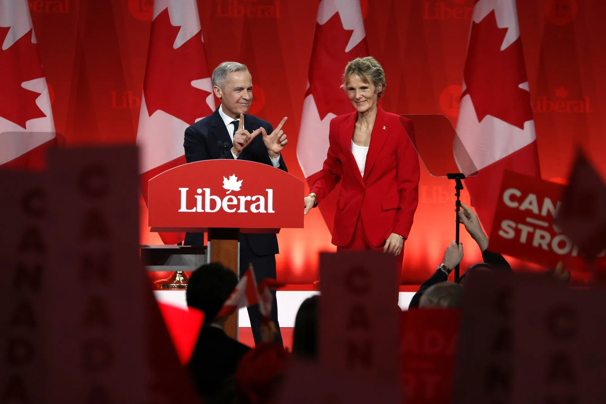 Mark Carney with his wife Diana Carney arrive for the party's leadership announcement event in Ottawa on March 9.