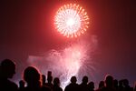 People watch a fireworks show in Del Mar, California, on July 4, 2017. 