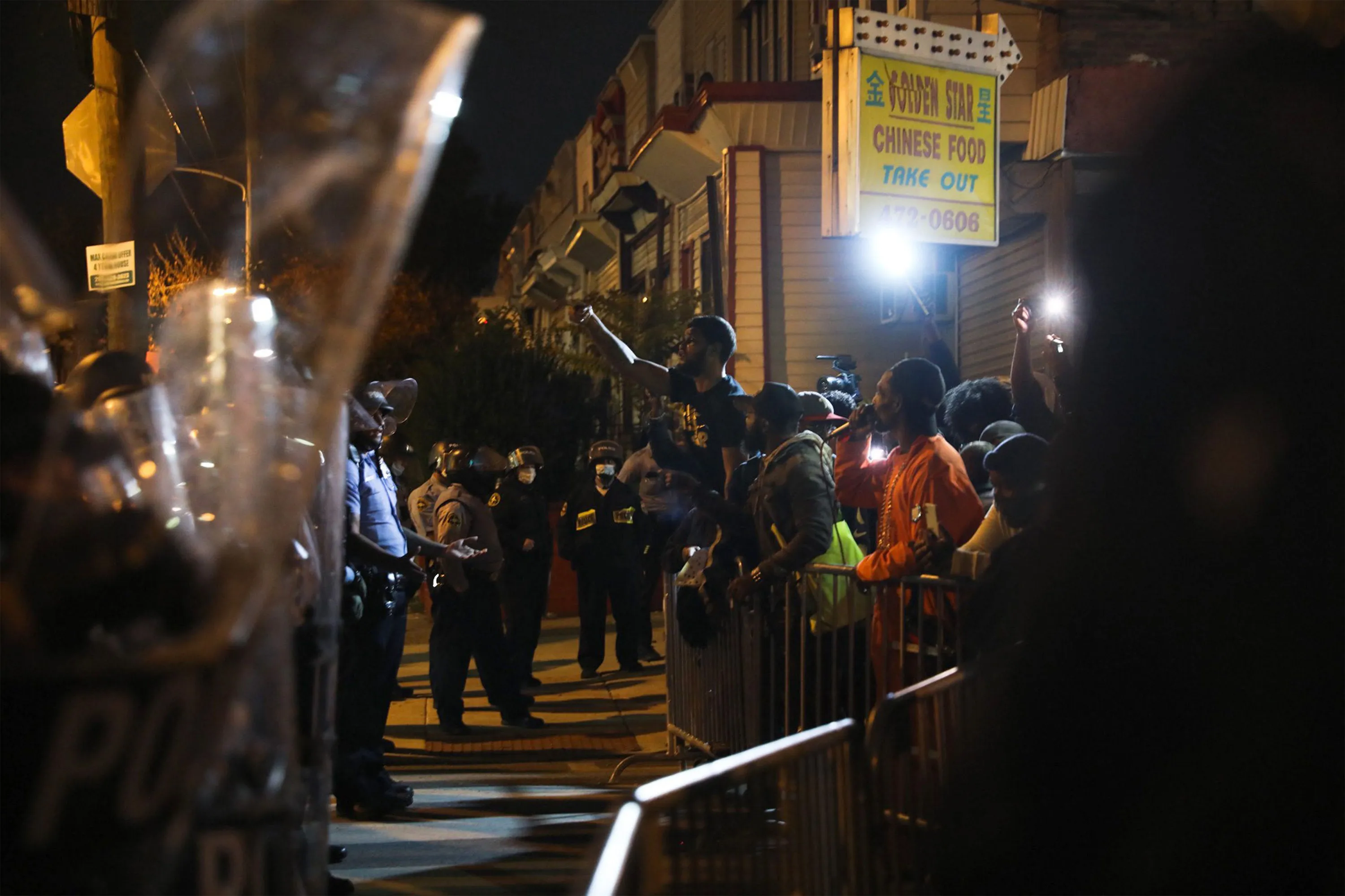 Police officers and protesters in Philadelphia on Oct. 27.