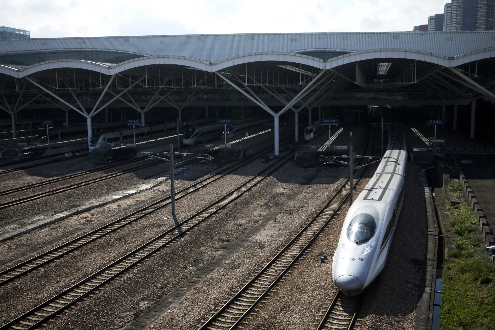 A China Railway High-speed (CRH) train, operated by China Railway Corp., leaves Shenzhen North Railway Station on Sunday, Sept. 23.