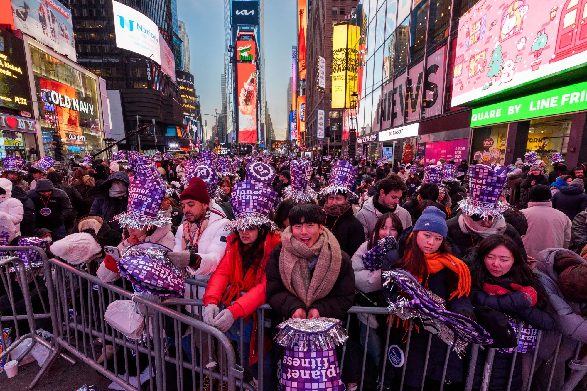 eople wait in Times Square ahead of New Year's Eve celebrations on December 31, 2025 in New York City.&nbsp;