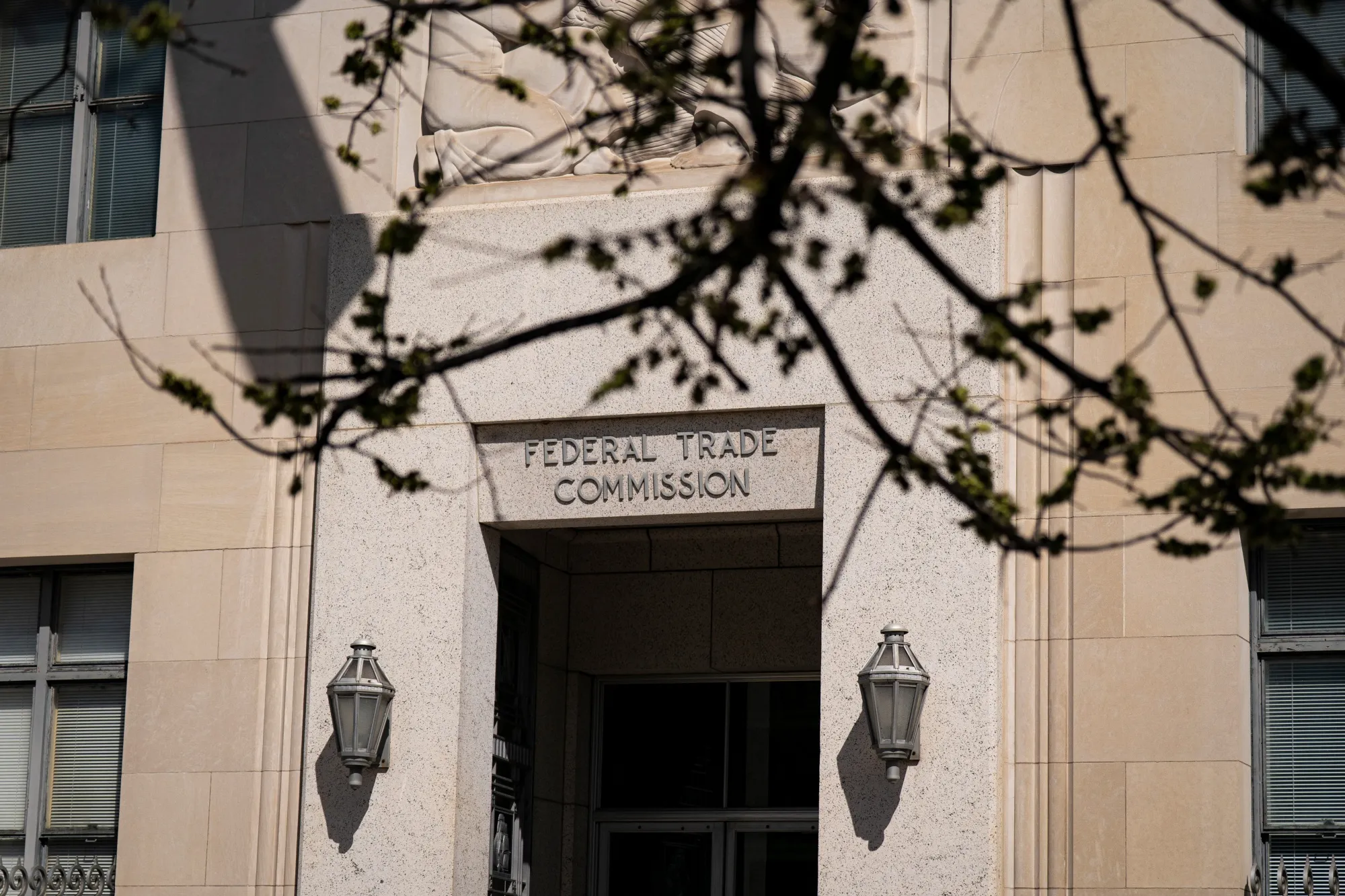 Trump Sued by Democratic FTC Commissioners Over Their Firings - Bloomberg