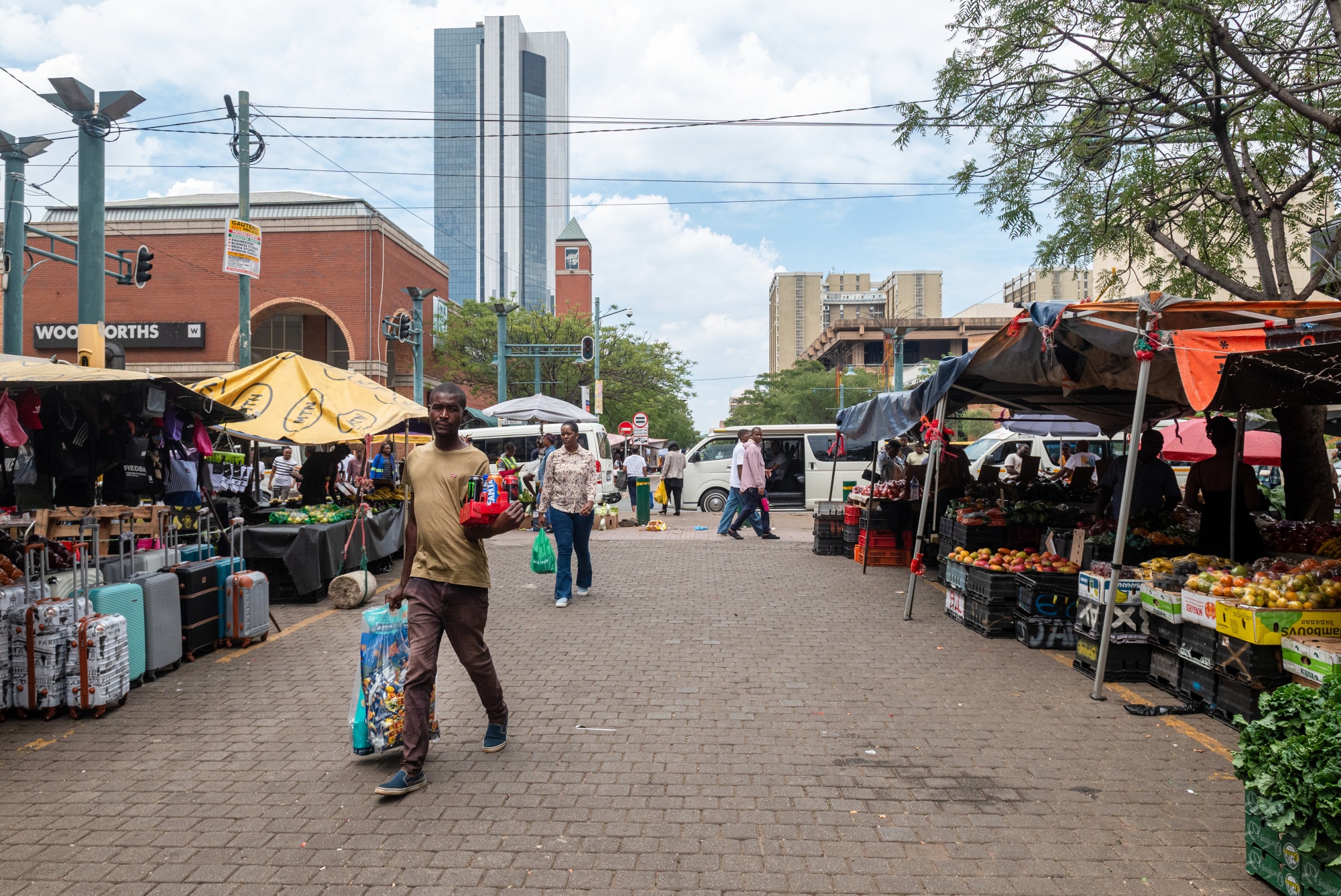 Street vendors in the central business district in Pretoria. Photographer: Leon Sadiki/Bloomberg