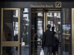 People enter Deutsche Bank AG headquarters on Wall Street in New York.