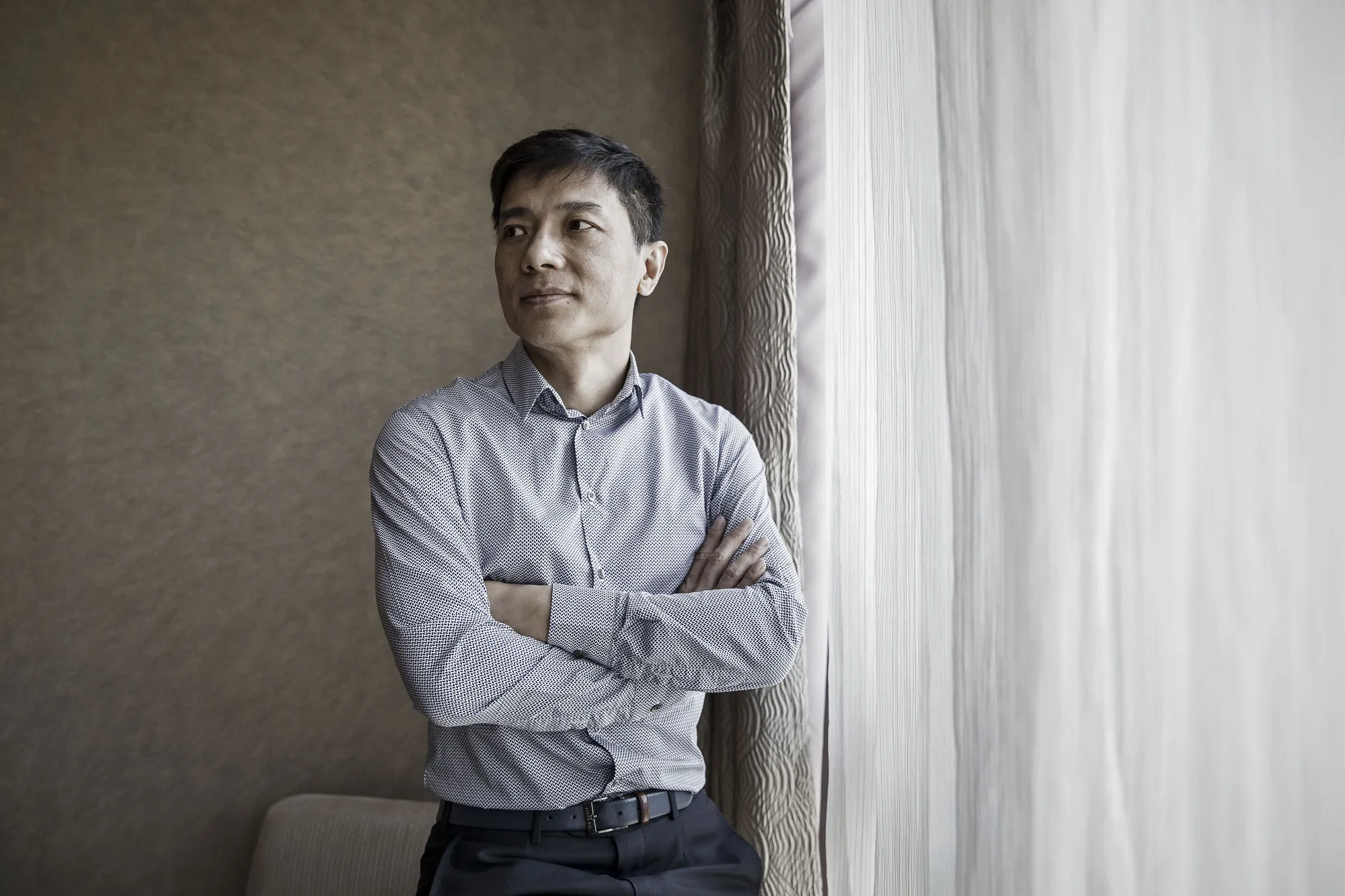 Robin Li&nbsp;poses for a photograph following a Bloomberg Television interview in Beijing, China, on&nbsp;March 10, 2017.&nbsp;