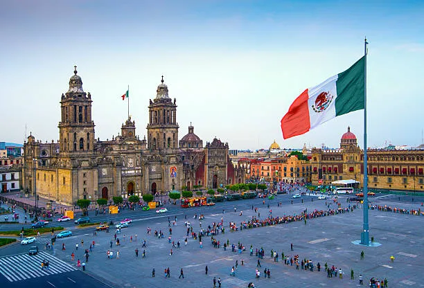 The Mexican flag flies over the main square in Mexico City, Zocalo, where Gen Zers plan a demonstration on Saturday.