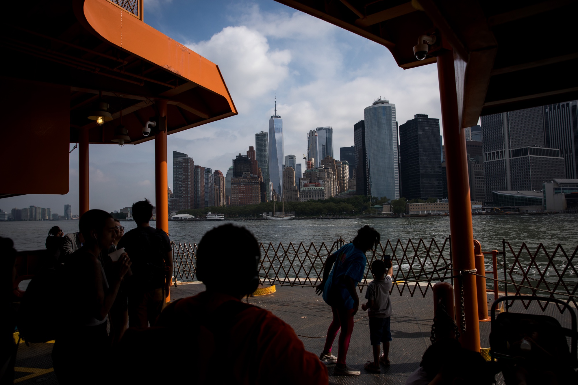 Commuters ride the Staten Island Ferry to Lower Manhattan in New York.