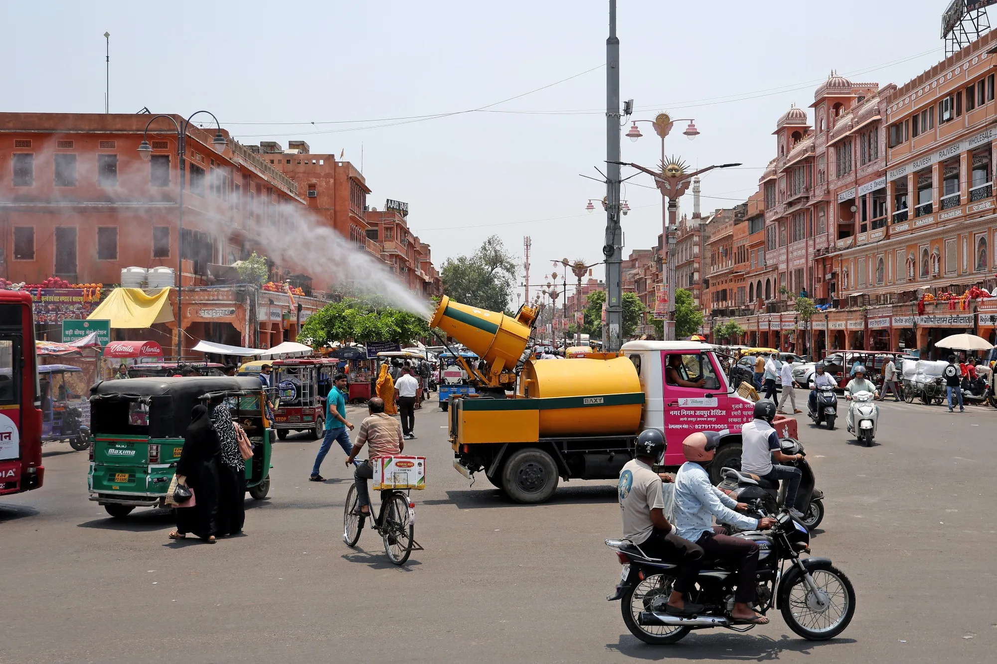 A truck sprays water mist to provide relief from the heat in Jaipur, India, on May 15.