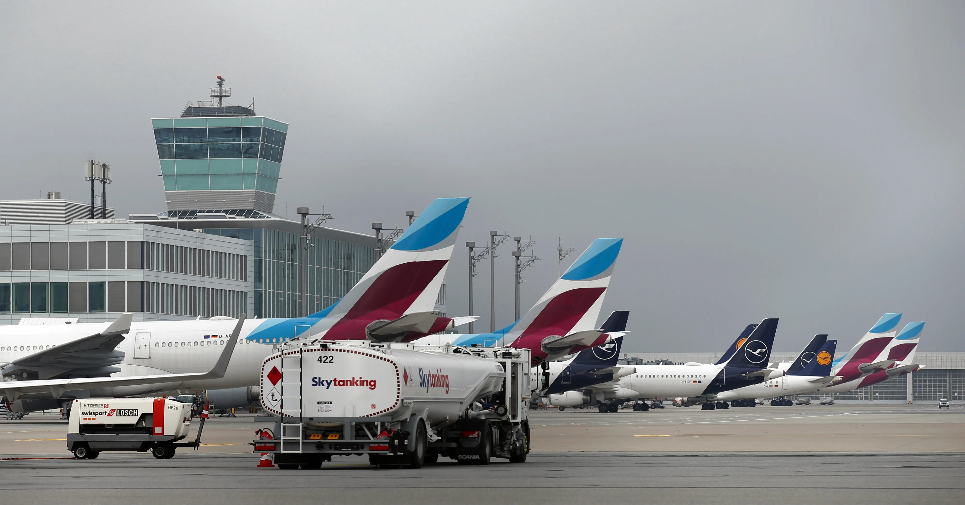 Eurowings and Deutsche Lufthansa AG aircraft at Munich Airport.