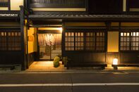 Street of Kyoto with traditional Machiya building with wooden screens and lattices