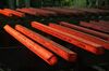 Lengths of red hot steel pass through a machine after shaping in the steel making shop at the OAO Izhstal steel plant, operated by OAO Mechel, in Izhevsk, Russia, on Friday, April 15, 2016.