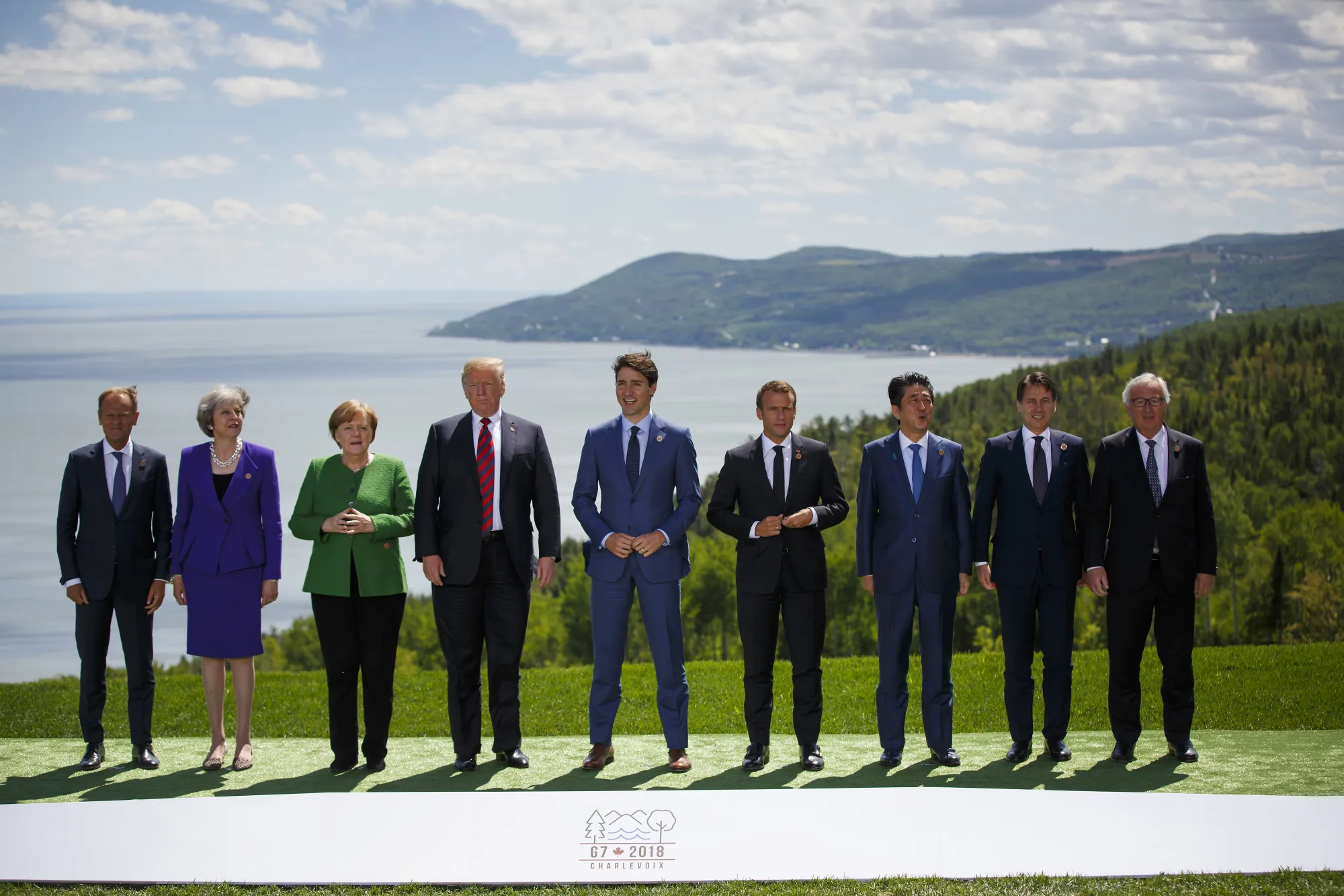 Donald Tusk, from left, Theresa May, Angela Merkel, Donald Trump, Justin Trudeau, Emmanuel Macron, Shinzo Abe, Giuseppe Conte, and Jean-Claude Juncker during the G7 Leaders Summit in Canada on June 8.