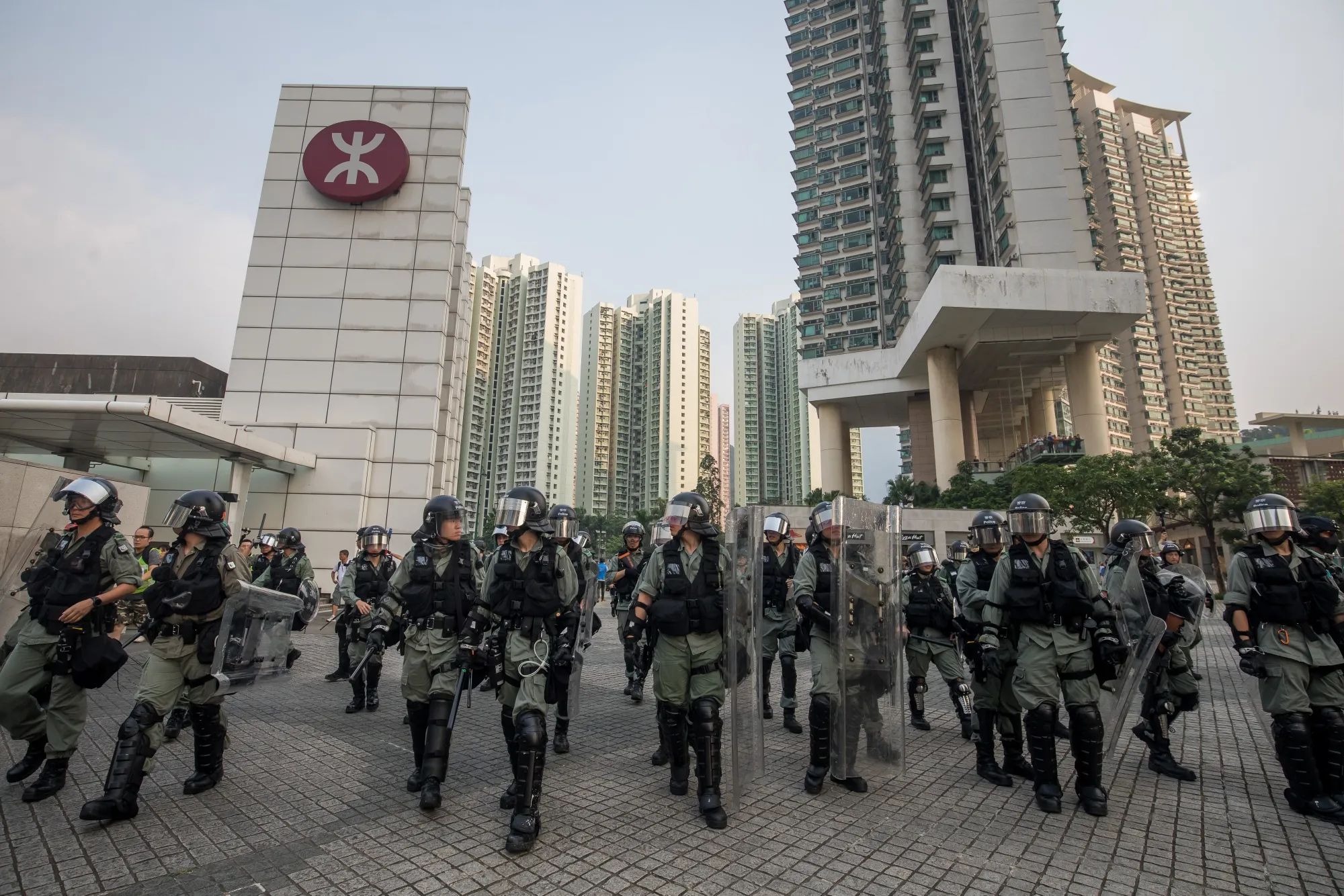 Riot police stand guard during a protest in Tung Chung, Hong Kong, on Sept. 7.