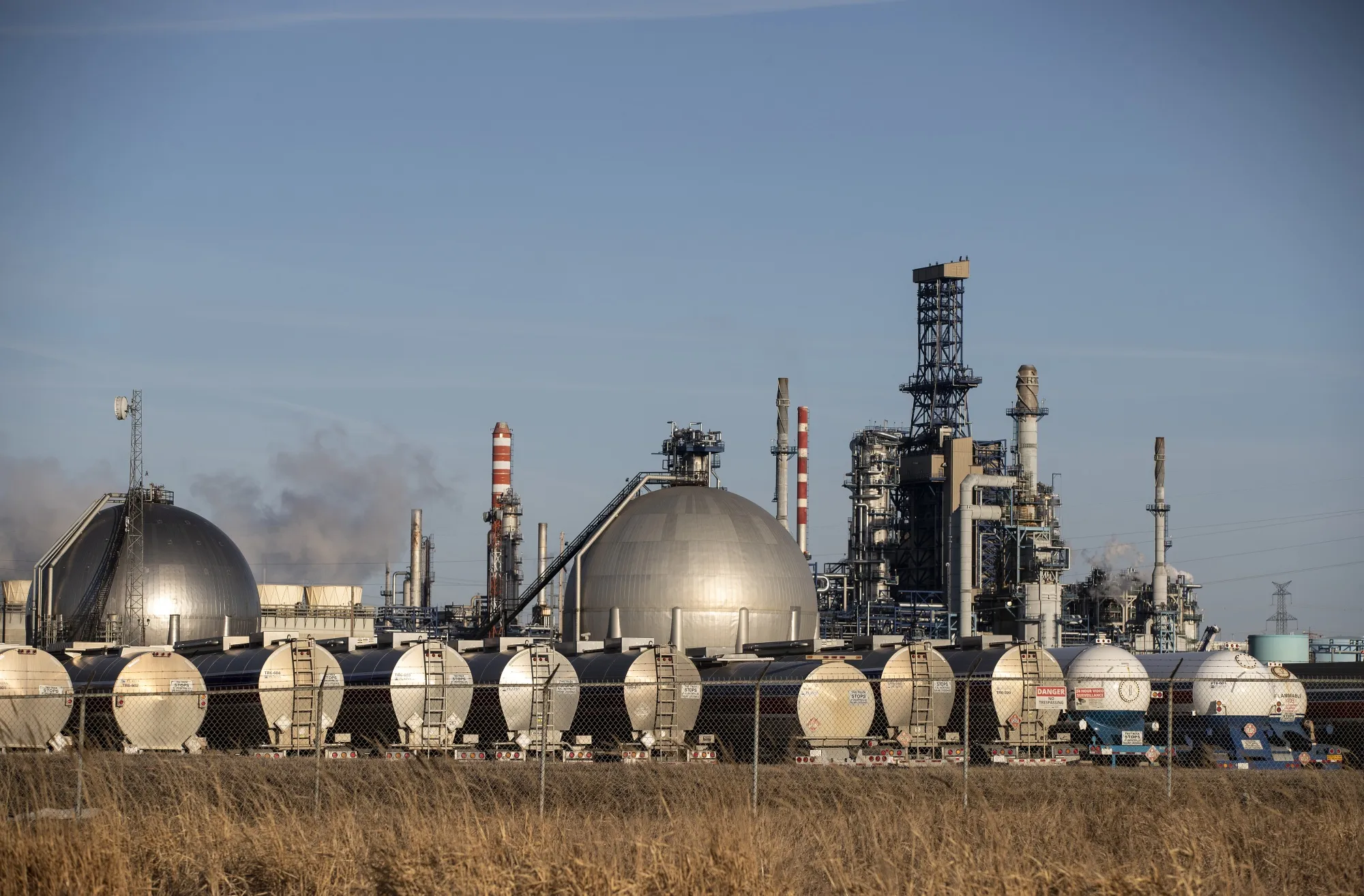 Storage tanks and trucks at a refinery in Edmonton, Alberta, Canada.