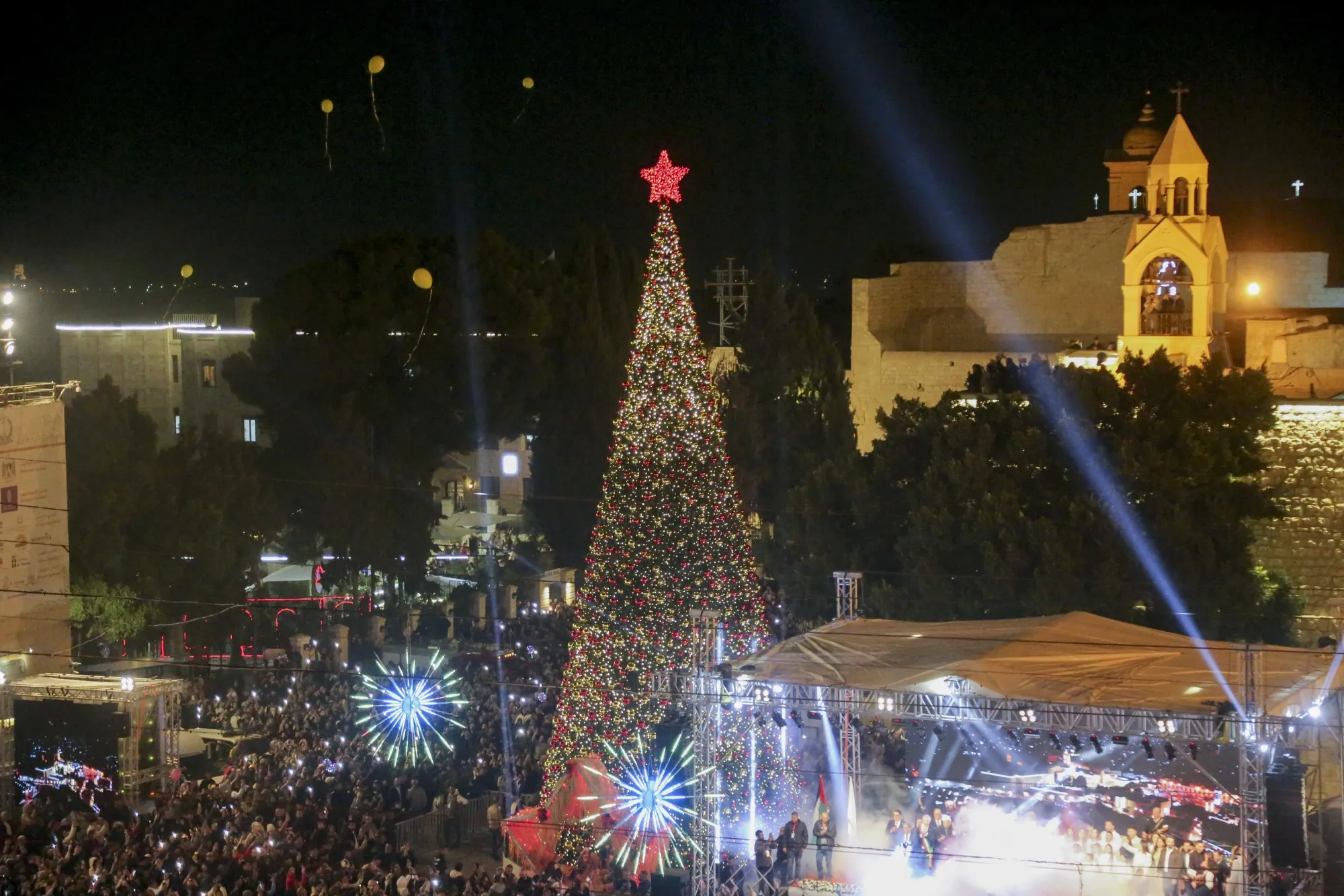 A&nbsp;crowd watches the Christmas-tree lighting and a&nbsp;live performance in Manger Square in Bethlehem, the West Bank, on Dec.&nbsp;6, 2025.&nbsp;