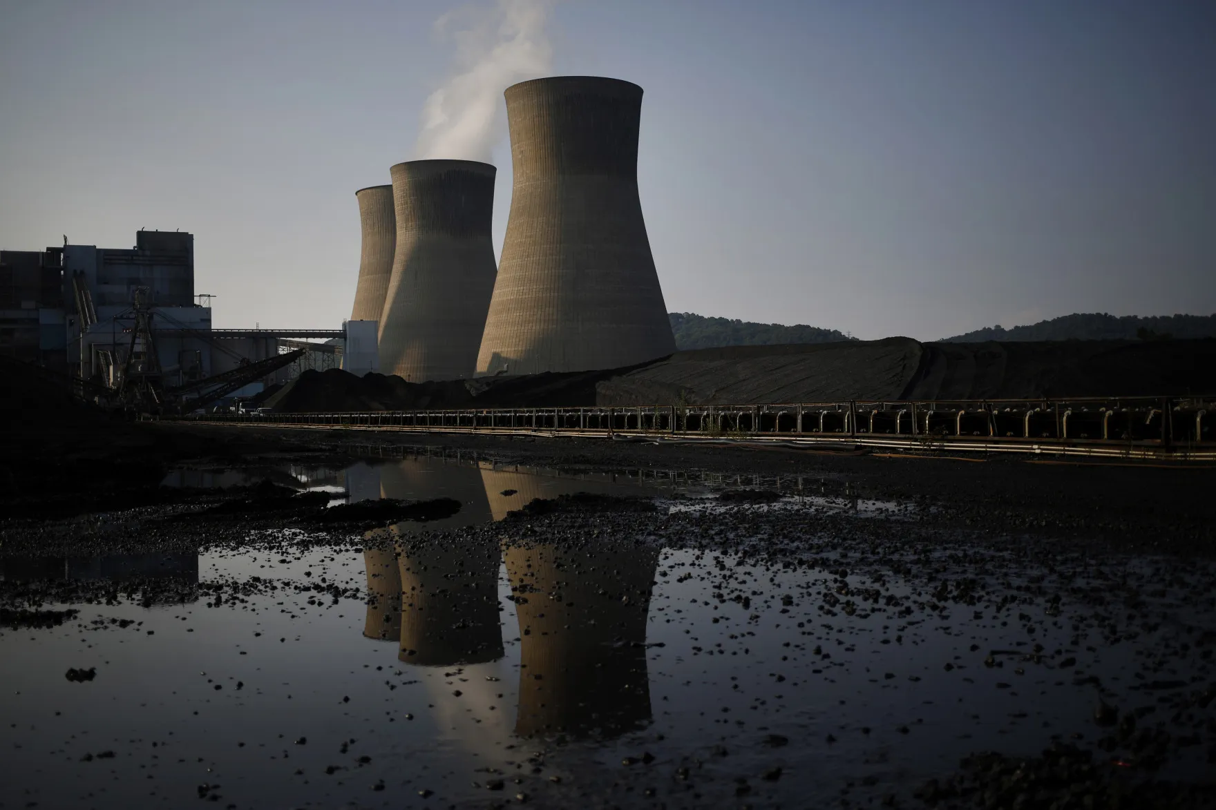 A plume of steam rises from a cooling tower of a&nbsp;coal-fired power plant in West Virginia.
