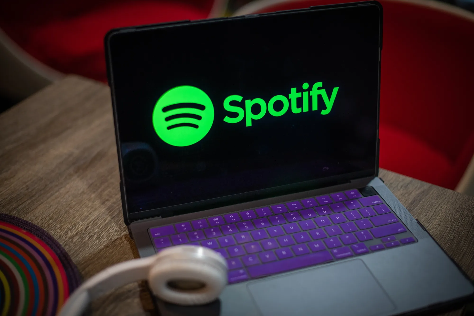 The Spotify logo on a laptop.