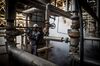 A worker operates a pipe control wheel at the Bushehr Petrochemical Co. plant during construction work in the Pars Special Economic and Energy Zone in Asaluyeh, Iran, on Monday, July 8, 2019. Shipping in the Middle East is getting ever riskier, with a standoff between the U.K. navy and Iran just the latest in a line of incidents in the region over the past few months.