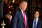 President-elect Donald Trump, center, accompanied by Trump Chief of Staff Reince Priebus, right, and Retired Gen. Michael Flynn, a senior adviser to President-elect Donald Trump, left, speaks to members of the media at Mar-a-Lago, in Palm Beach, Fla., Wednesday, Dec. 21, 2016. (AP Photo/Andrew Harnik)