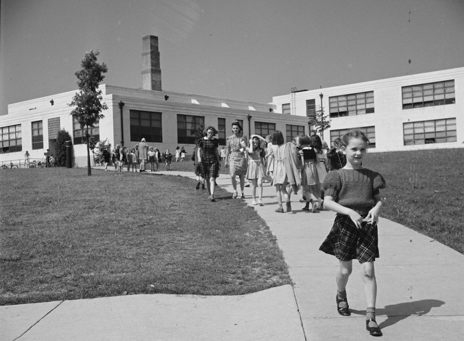 Children walking home from school in Greenbelt, Maryland, in 1942.