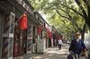 Chinese flags line a street ahead of the 70th anniversary of the People's Republic of China celebrations in the Hutong district of Beijing, China, on Monday, Sept. 30, 2019. The Communist Party of China prepares to celebrate 70 years in power amid challenges to its authority from the unrest in Hong Kong and an economy weakened by the trade war.