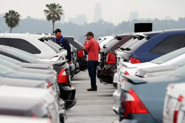 Customers shop for a Ford Edge at the Star Ford dealership in Glendale, California.