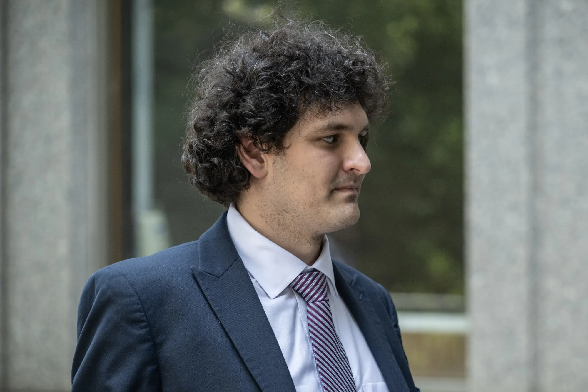 Sam Bankman-Fried arrives at court in New York in July. 
