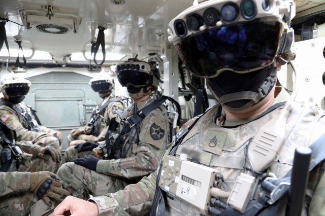 Soldiers don the Integrated Visual Augmentation System Capability Set 3 hardware while mounted in a Stryker in Joint Base Lewis-McCord, Washington.