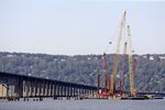 Cranes surround the construction site at the Tappan Zee Bridge that spans the Hudson River near Nyack, N.Y., on Oct. 6