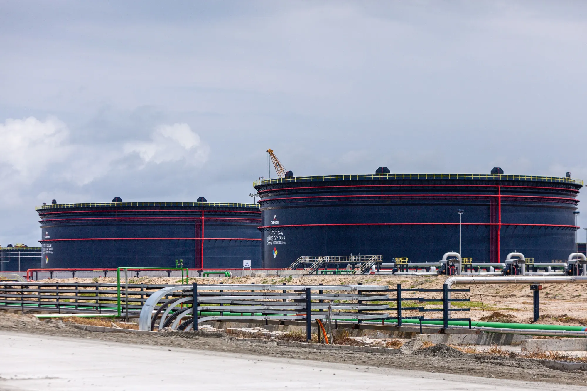 Gasoline storage tanks at the Dangote Industries Ltd. oil refinery and fertilizer plant site in the Ibeju Lekki district of Lagos, Nigeria.