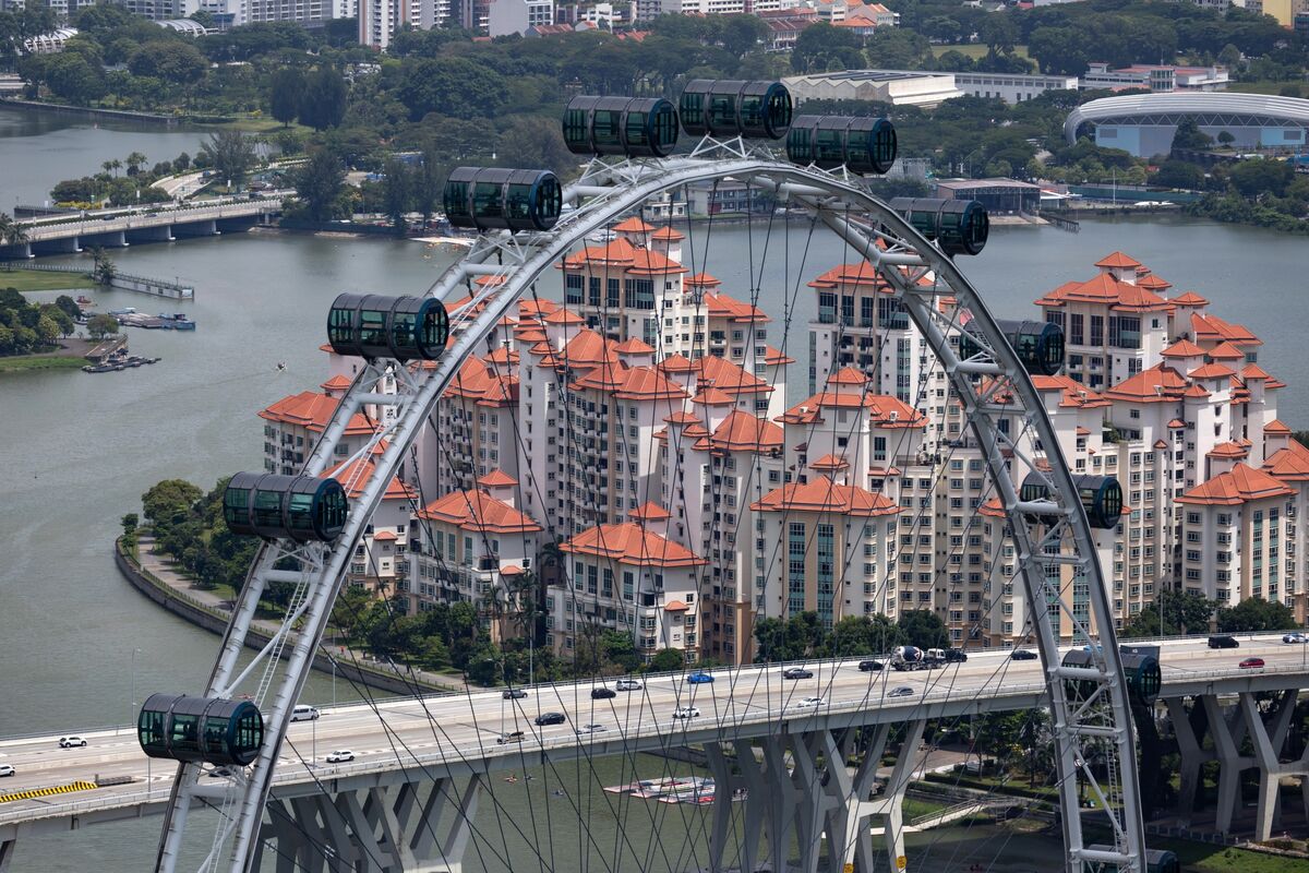 featured image thumbnail for post Singapore Home Sales Surge to Decade High, Stoking Curb Concerns