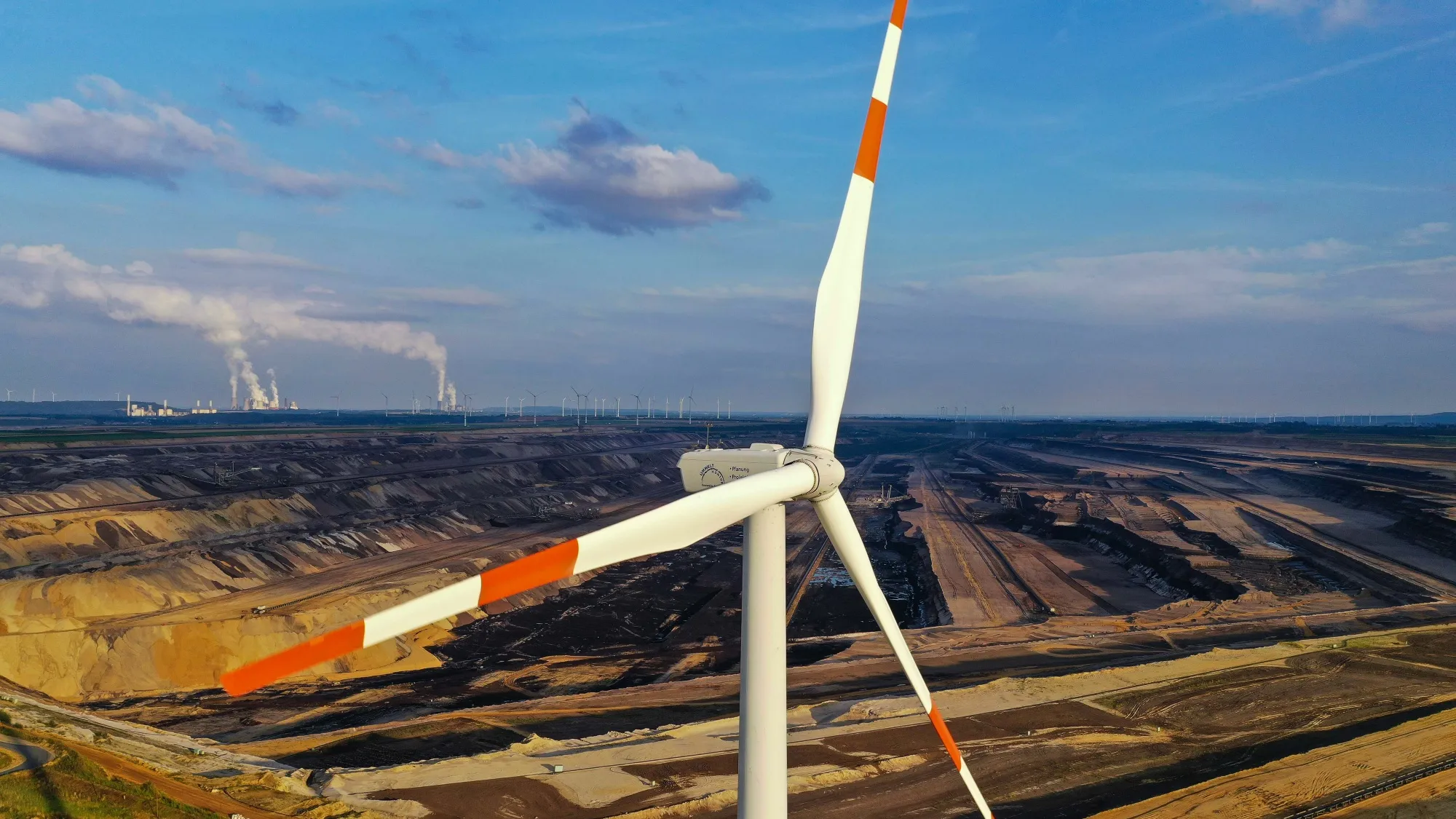 RWE AG Lignite Mine and Windfarm As Climate Scientists Call For Rapid End of Fossil Fuels 