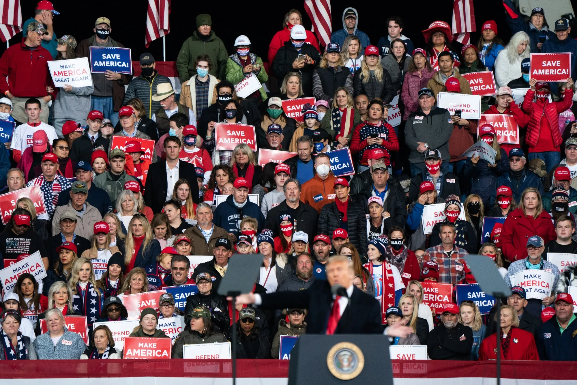 Attendees attend a Trump rally in Valdosta, Georgia, on Dec. 5.