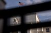 An American flag flies outside the Marriner S. Eccles Federal Reserve building in Washington, D.C., U.S., on Wednesday, July 31, 2019. The Federal Reserve is widely expected to lower interest rates by a quarter-point at its meeting that concludes Wednesday and leave the option open for additional moves despite demands by President Donald Trump for a "large" rate cut.