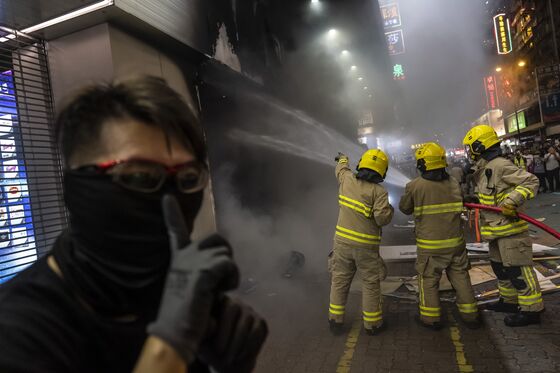 Hong Kong’s Lam to Visit Japan as Protest Violence Continues
