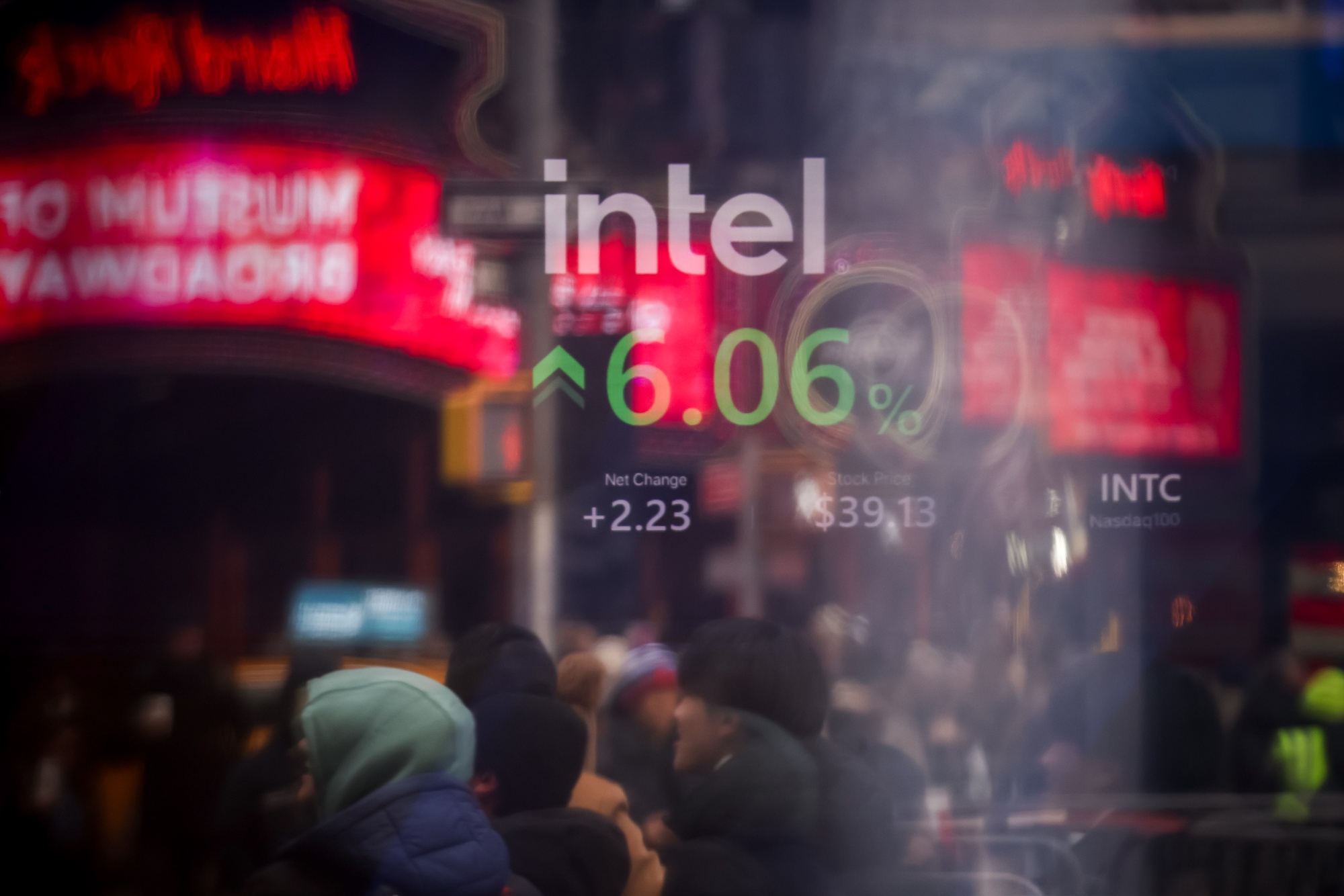 Intel Corp. signage at the Nasdaq MarketSite in New York, US, on Friday, Jan. 2, 2026. Weakness in tech stocks weighed down broader US indexes on Friday, as investors started 2026 on cautious footing.