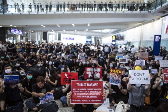 Hong Kong Protesters Bring Their Fight to the City’s Airport