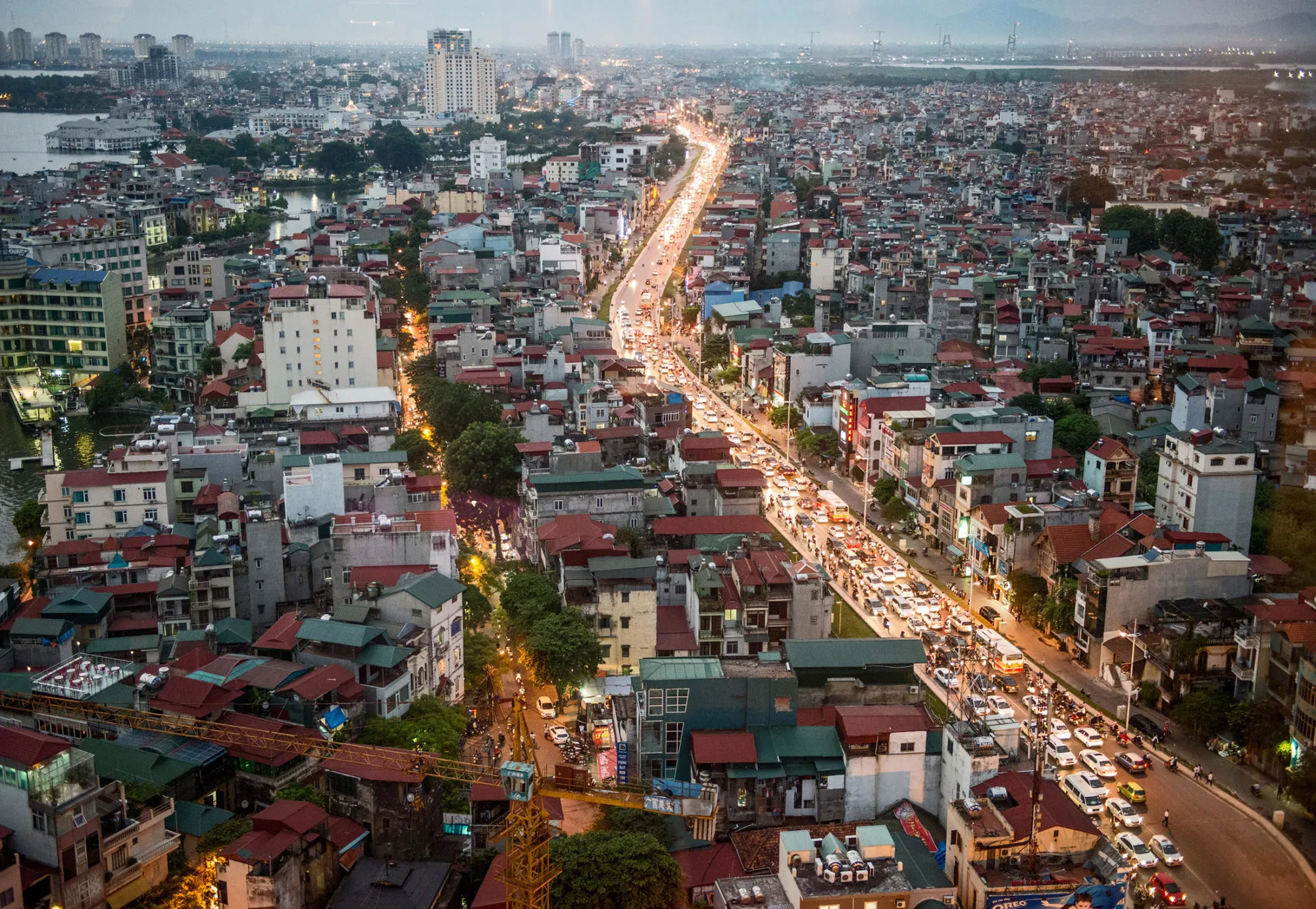 Traffic moves along a road in Hanoi.
