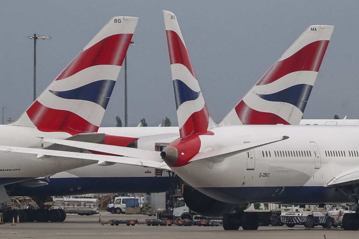 British Airways Owner Pares Growth Plan, Hurting Profit Goal Bloomberg