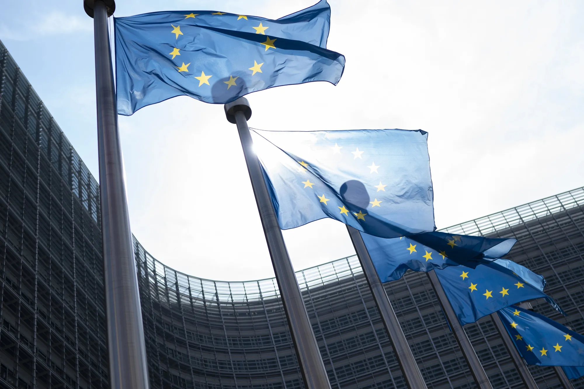European Union (EU) flags fly.
