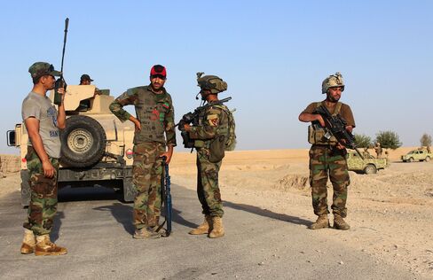 Afghan National Security Forces patrol after recent clashes on Aug 12.