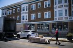 A worker makes a delivery to a store in Ocean City, New Jersey.
